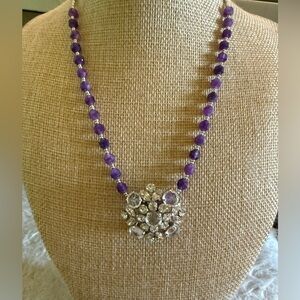 Single Sherman earring repurposed into pendant on amethyst stone necklace